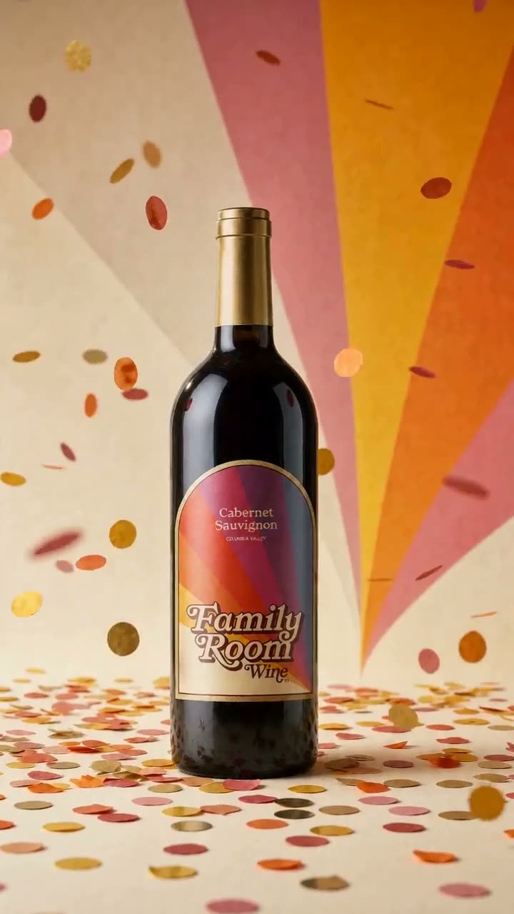 Confetti falling around a bottle of Family Room Cabernet Sauvignon